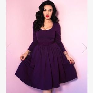 Troublemaker Swing in Purple by Micheline Pitt